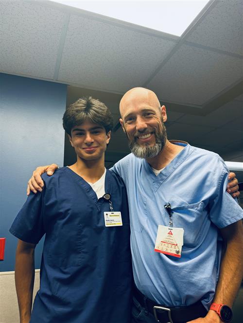 Abdel poses with a member of the Emergency Care team at Wake Med