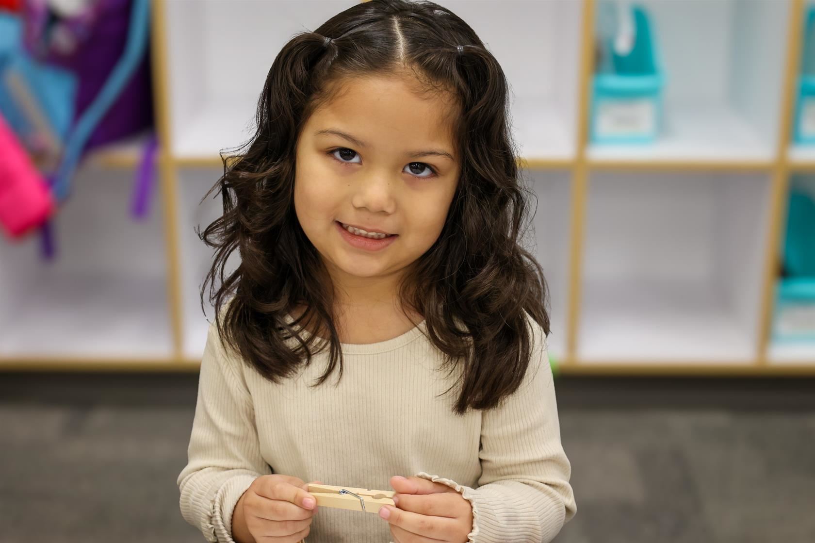 student smiling at early learning center