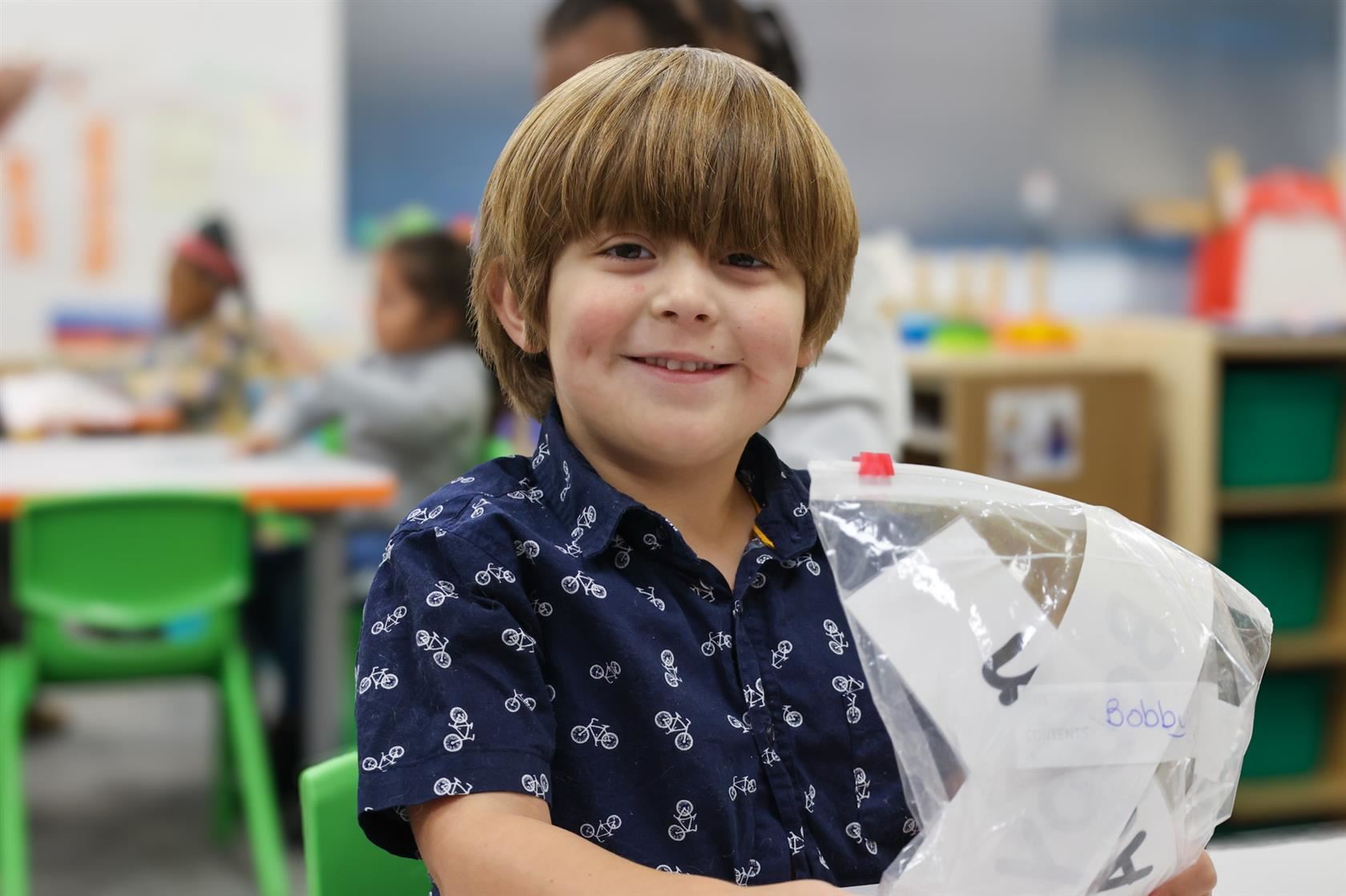 student smiling at early learning center