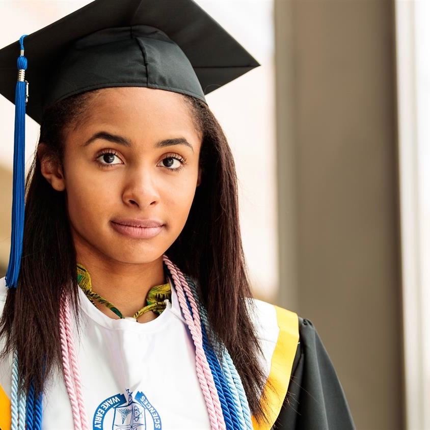  graduate in cap and gown