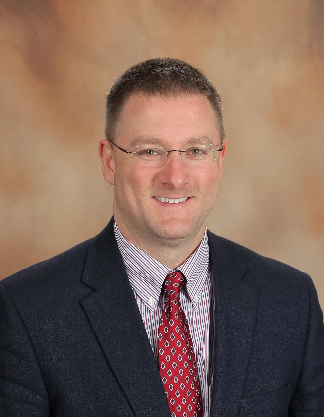 Headshot of Principal Jonathan Enns 
