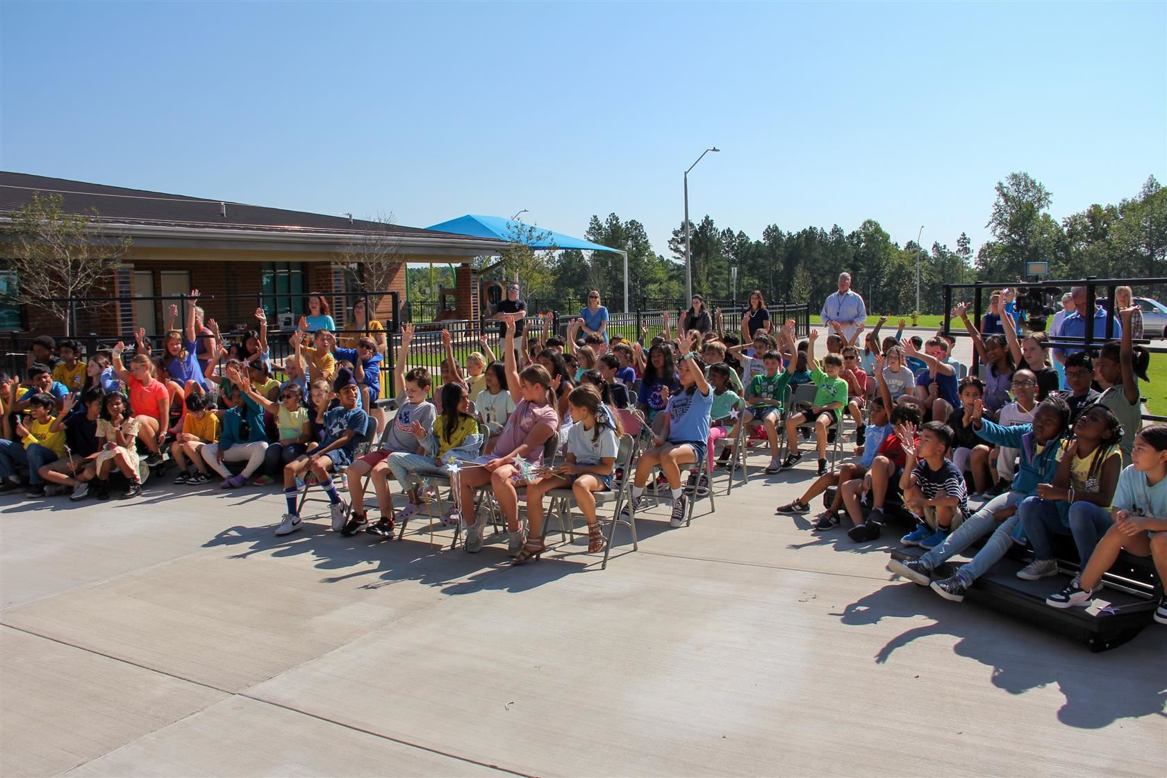 Students attending ribbon cutting