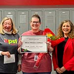  Ms. Lomelino receiving the grant.