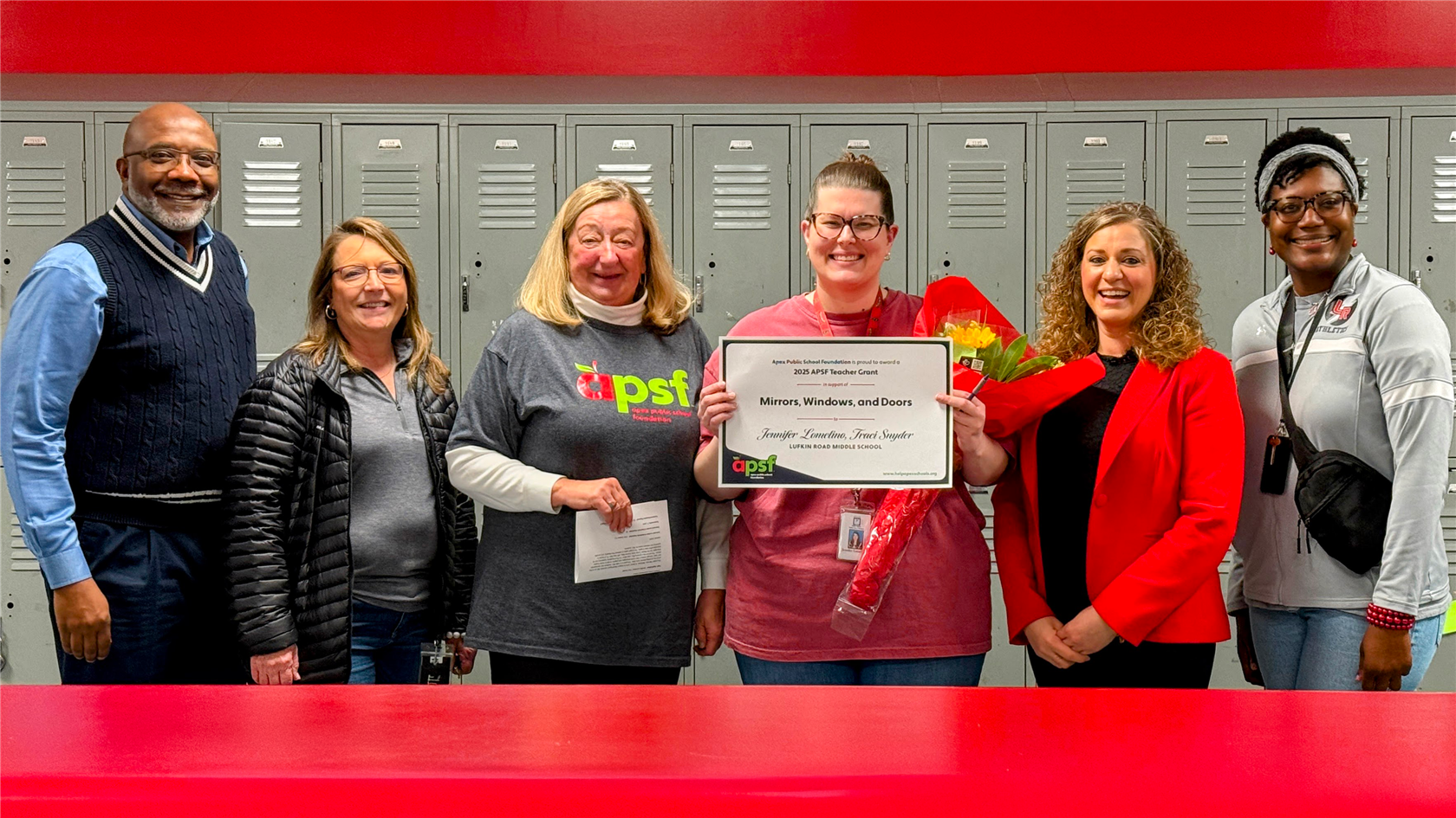 Ms. Lomelino receiving her grant.