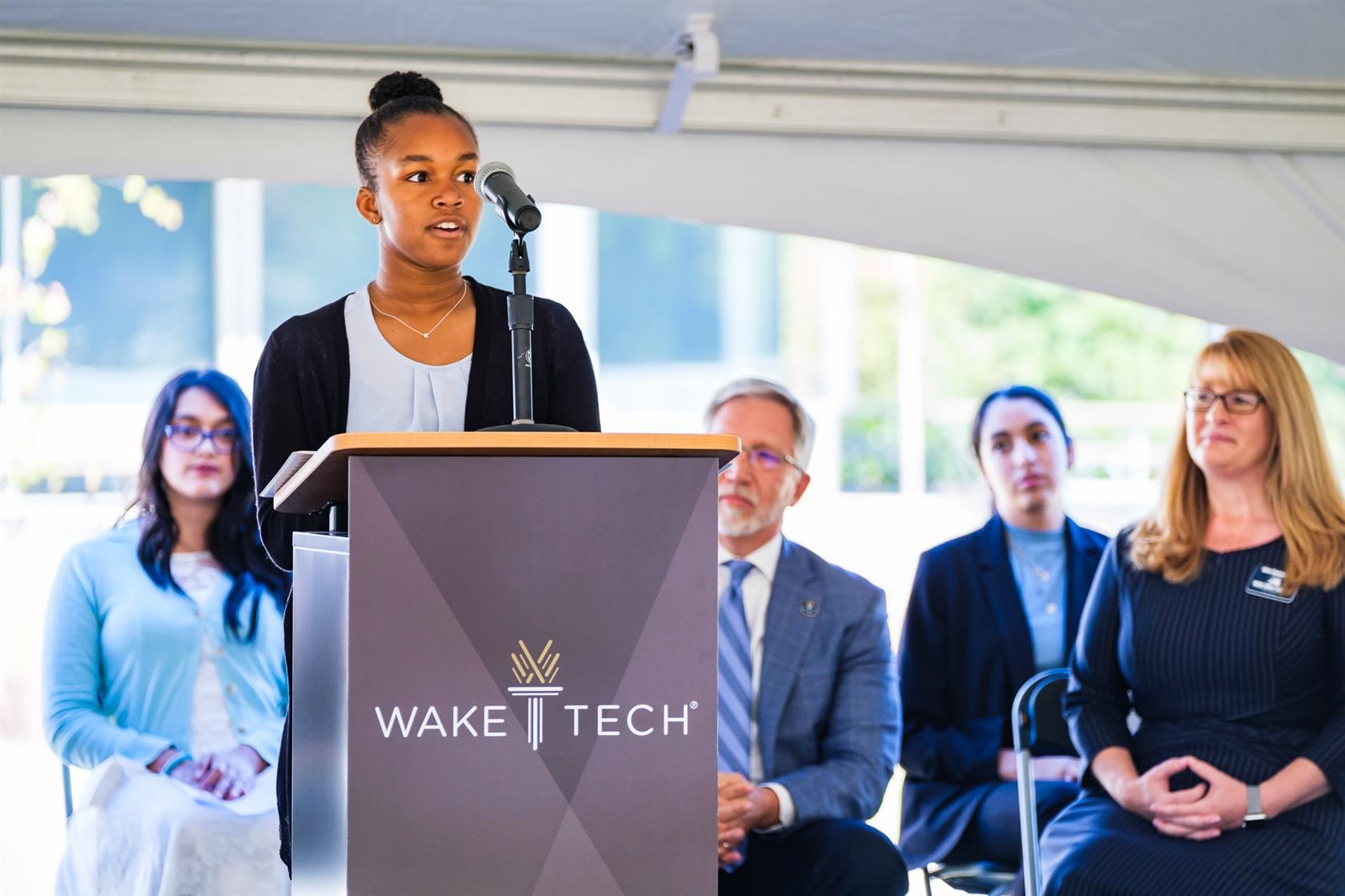 Photo of student speaking at the Wake Early College of Information and Biotechnologies Ribbon Cutting Ceremony.