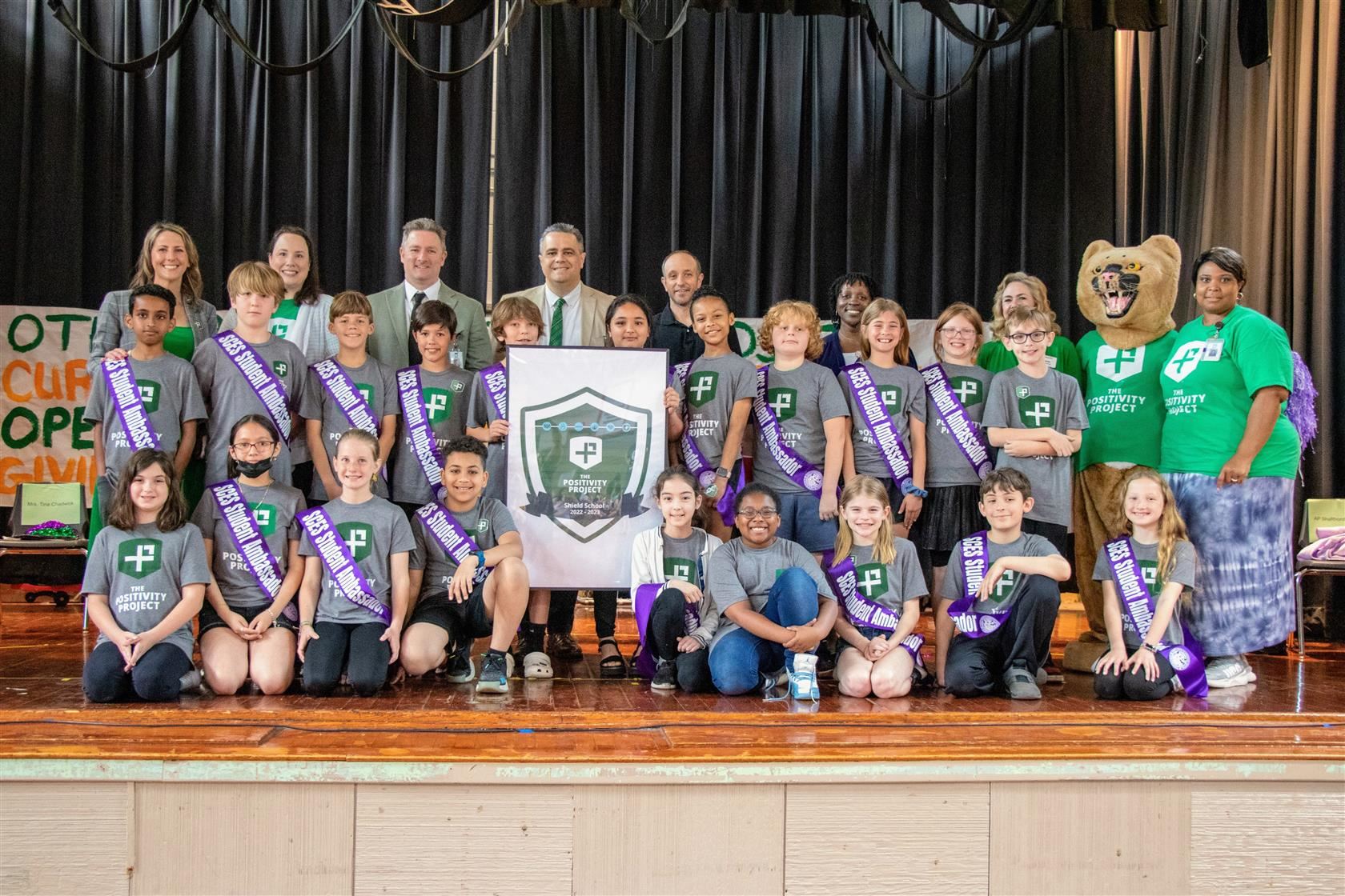 Students and staff with the Green Shield Award.