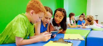 Students looking at a computer 