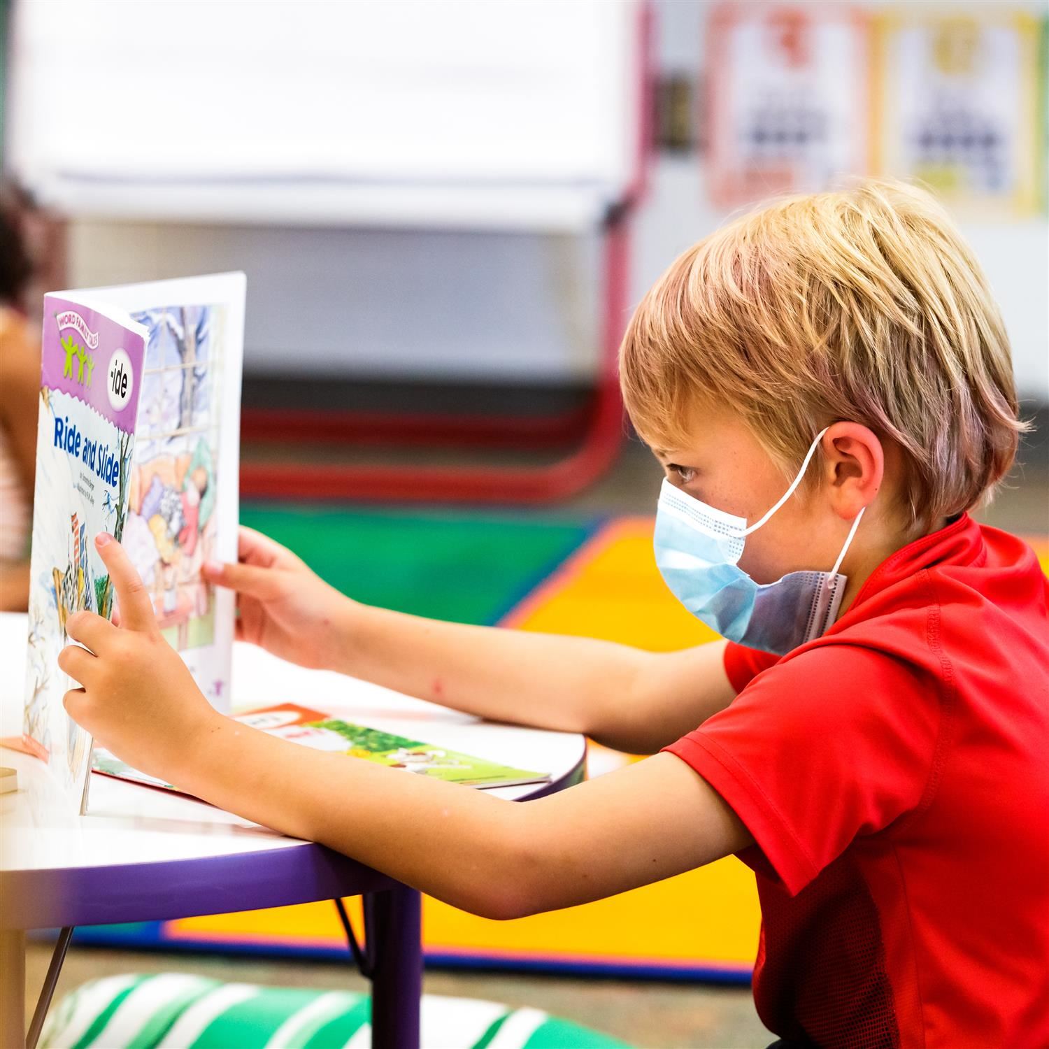  photo of a student reading a book