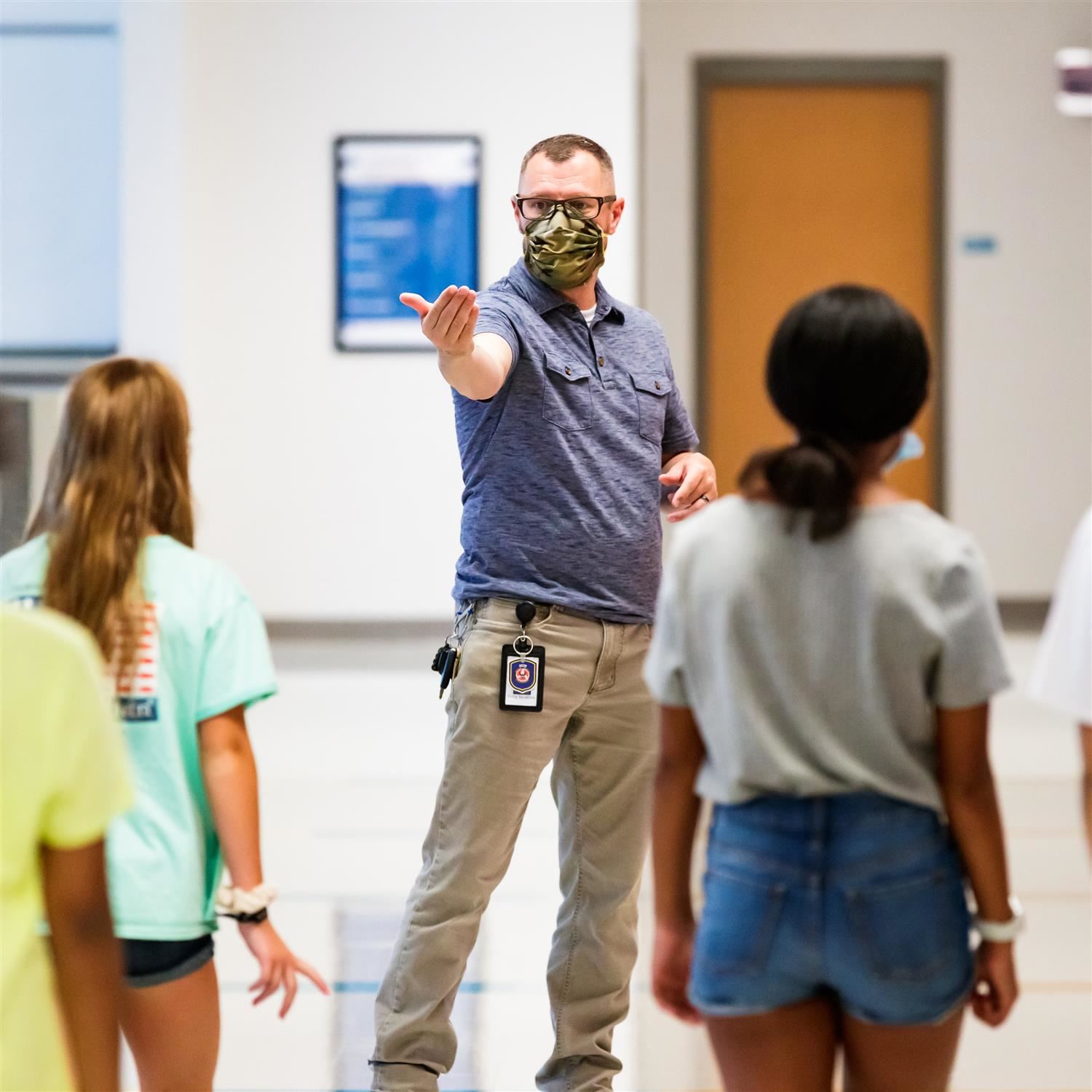  photo of principal wearing face covering