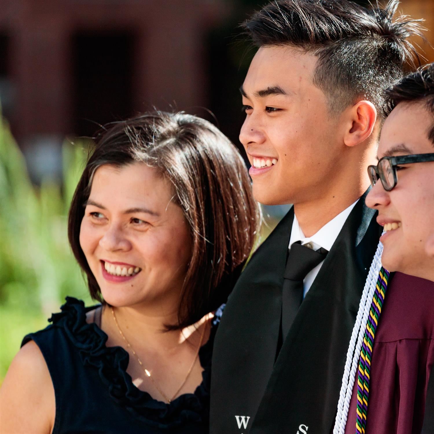  Graduating student smiling with parent