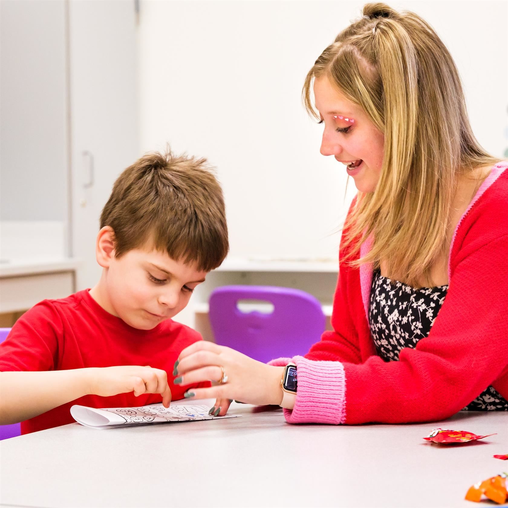 Special education teacher works with student