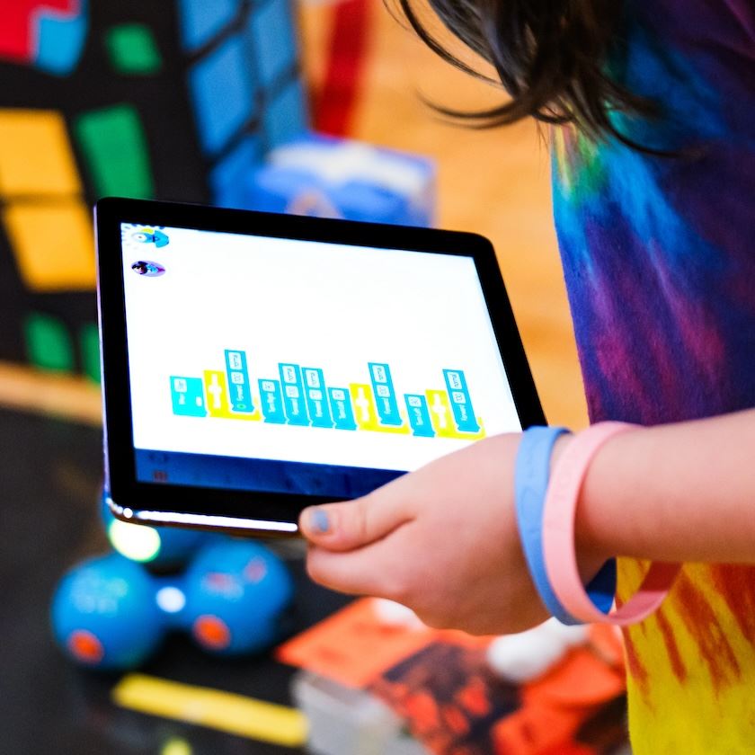 Close-up photo of a digital tablet in a student's hand