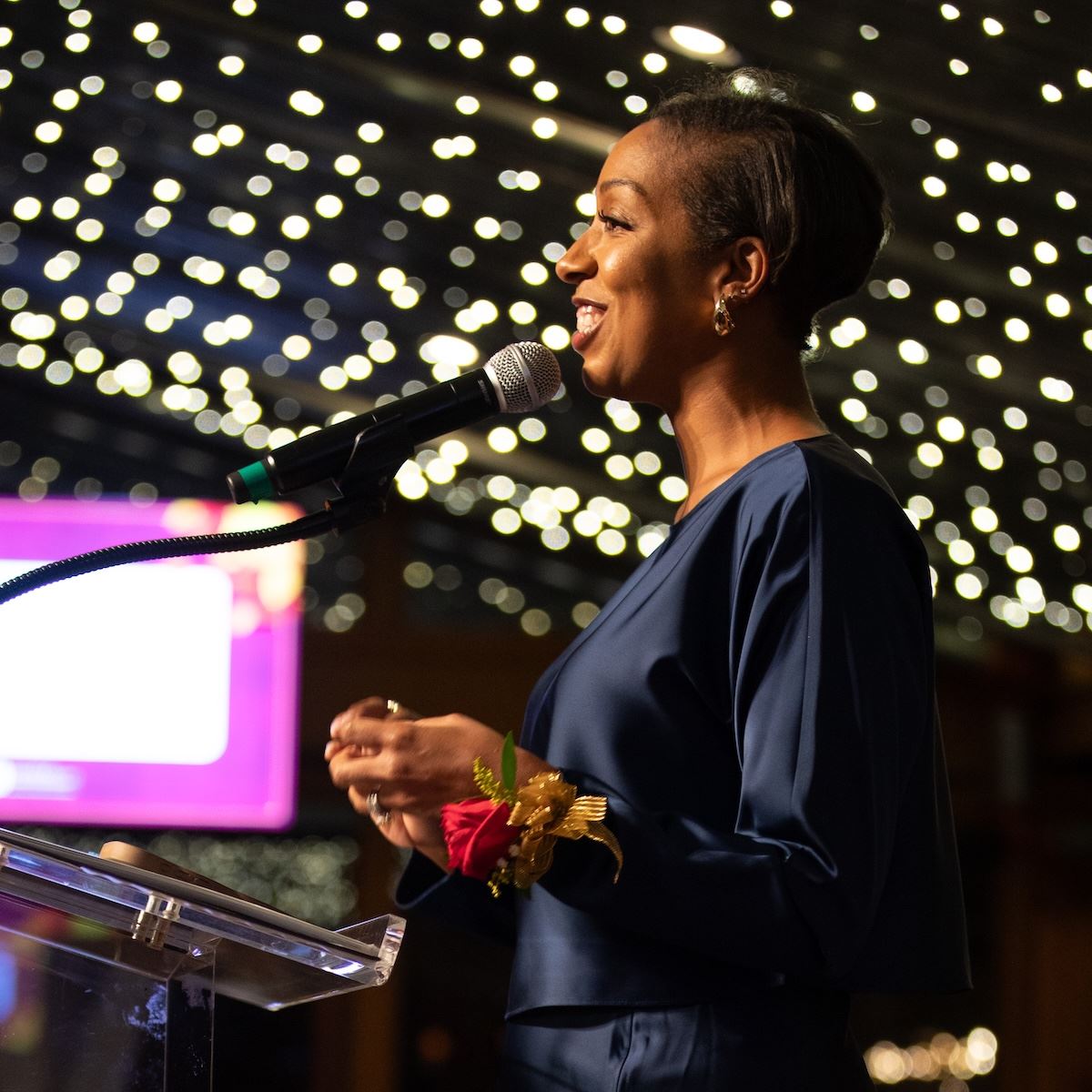  Dr. Mariah Walker accepts her award as Principal of the Year.