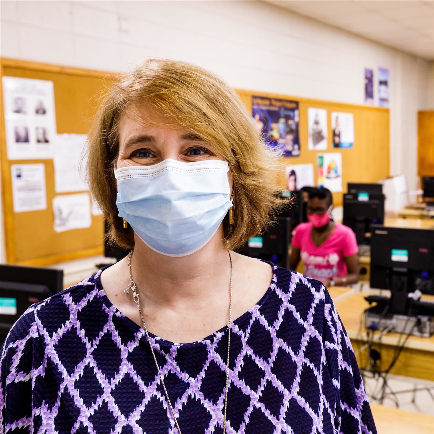  photo of person with face mask on