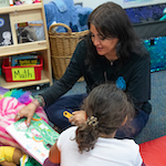  New student meets their teacher at an open house event