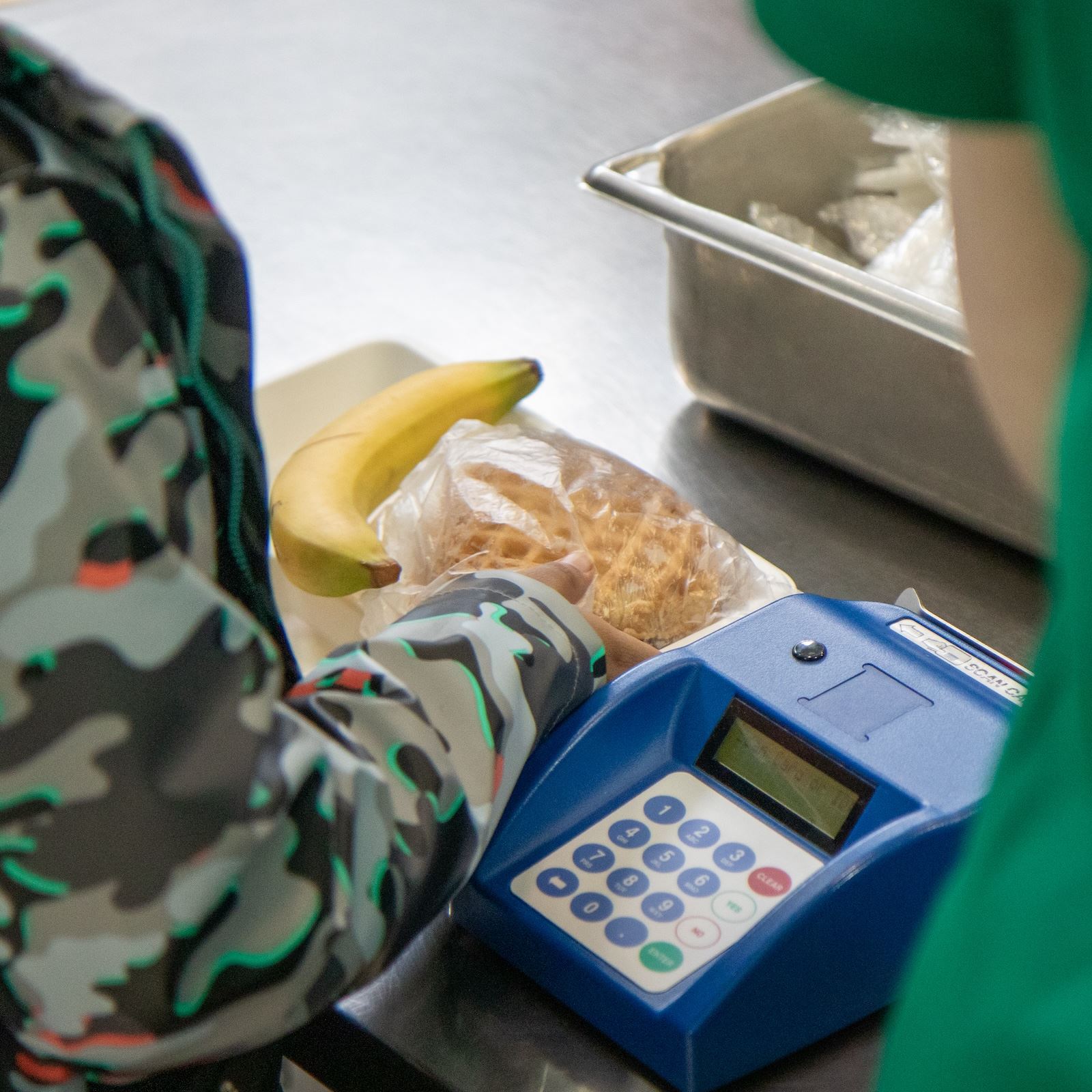  Close-up photo of a lunch tray at a cash register.