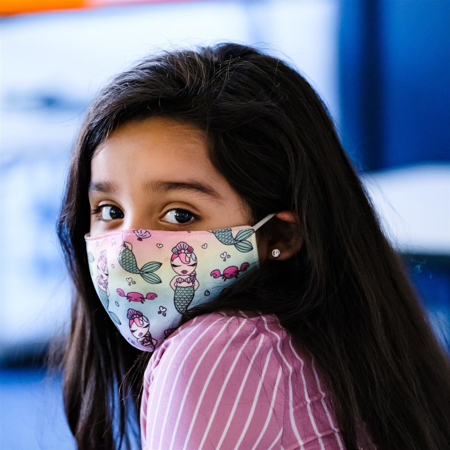  student wearing a face covering