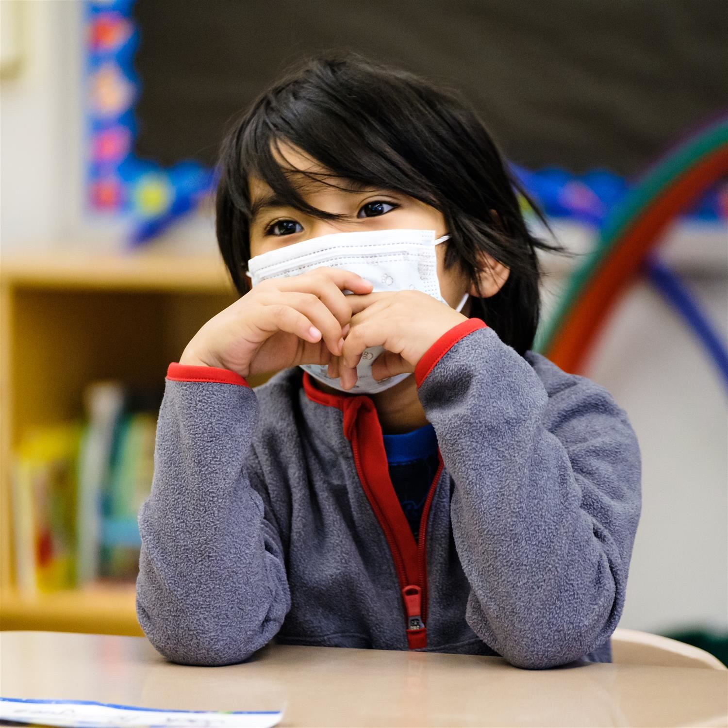  photo of boy wearing face mask