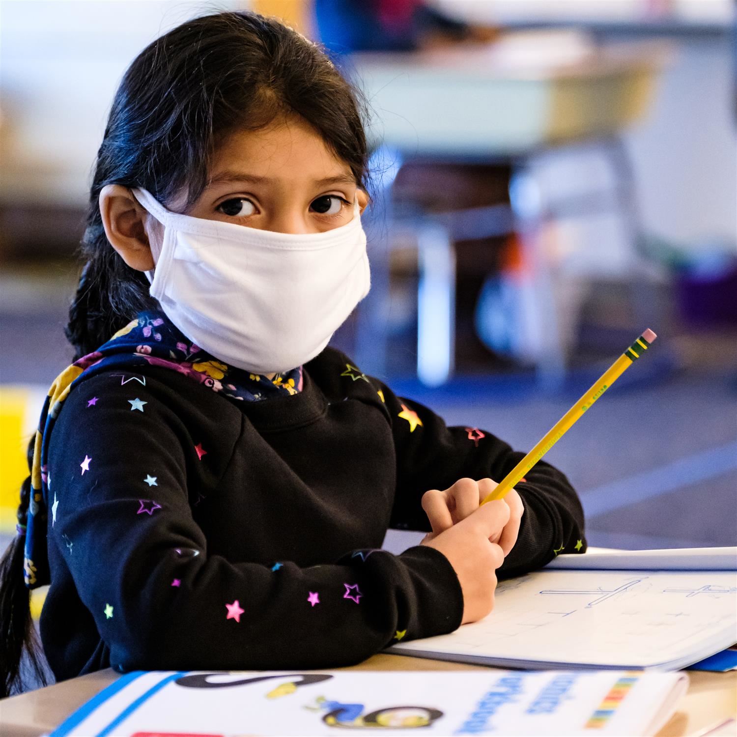  student wearing a face covering