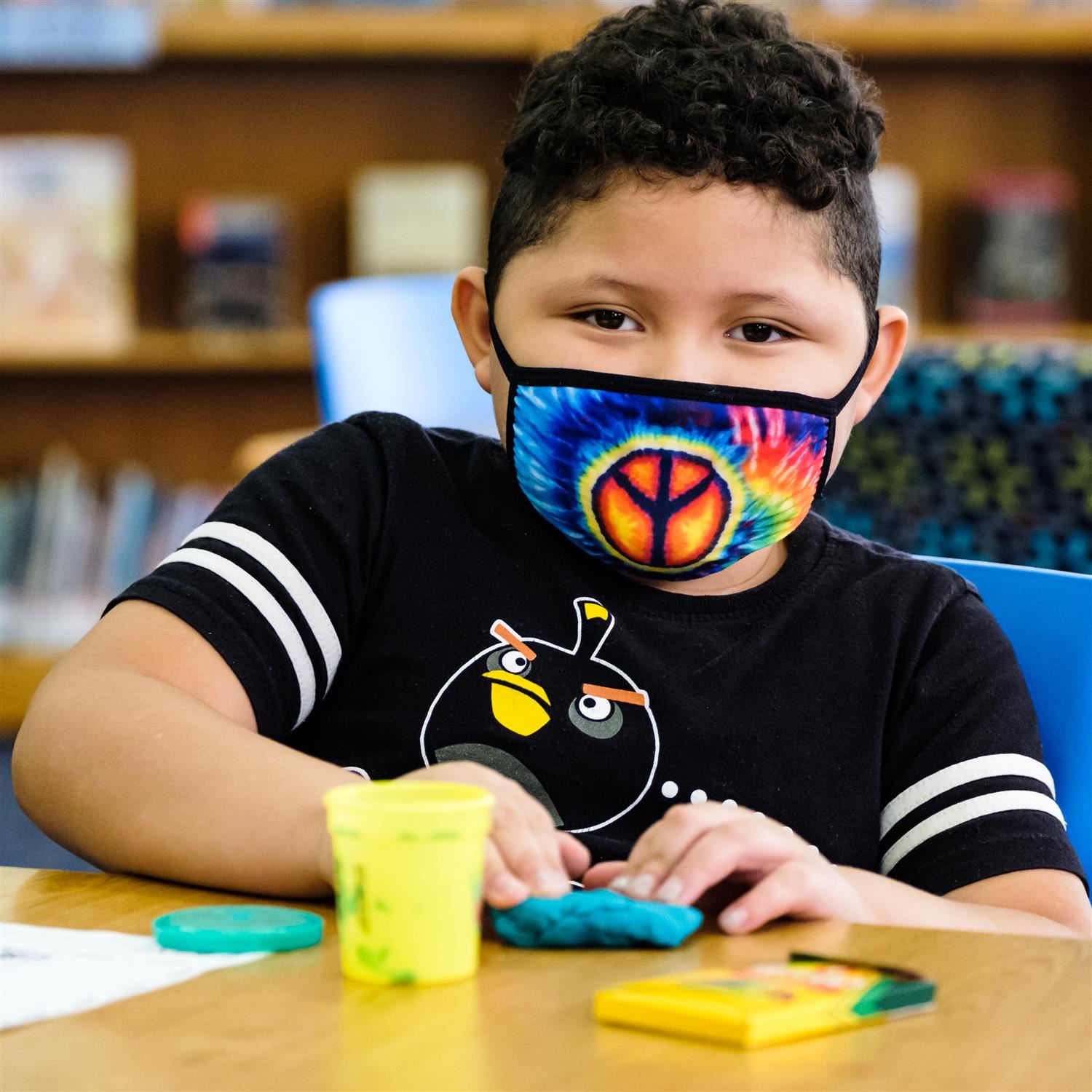  Student working with Play-Doh during Art Class.