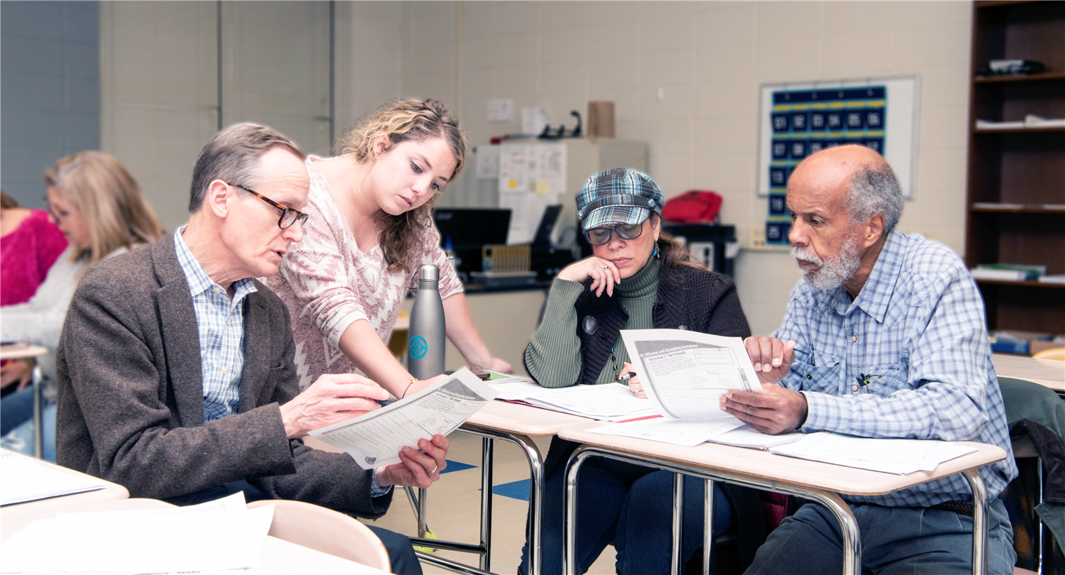 Adult evening education class teaching Spanish. 