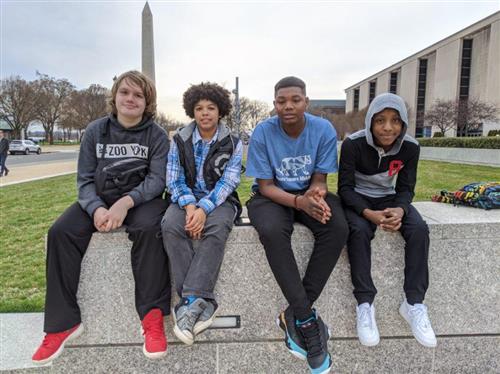 4 boys in front of Washington Monument 