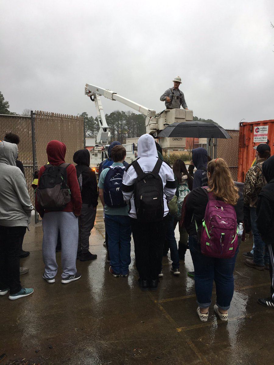 Students watching crane demonstration