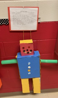 Students create robots using 3D shapes.