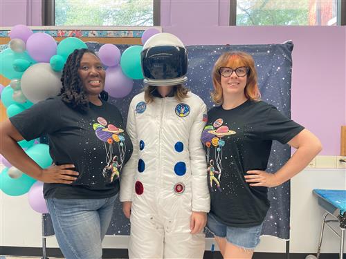 Picture of two fourth grade teachers and the Partnership Astronaut 