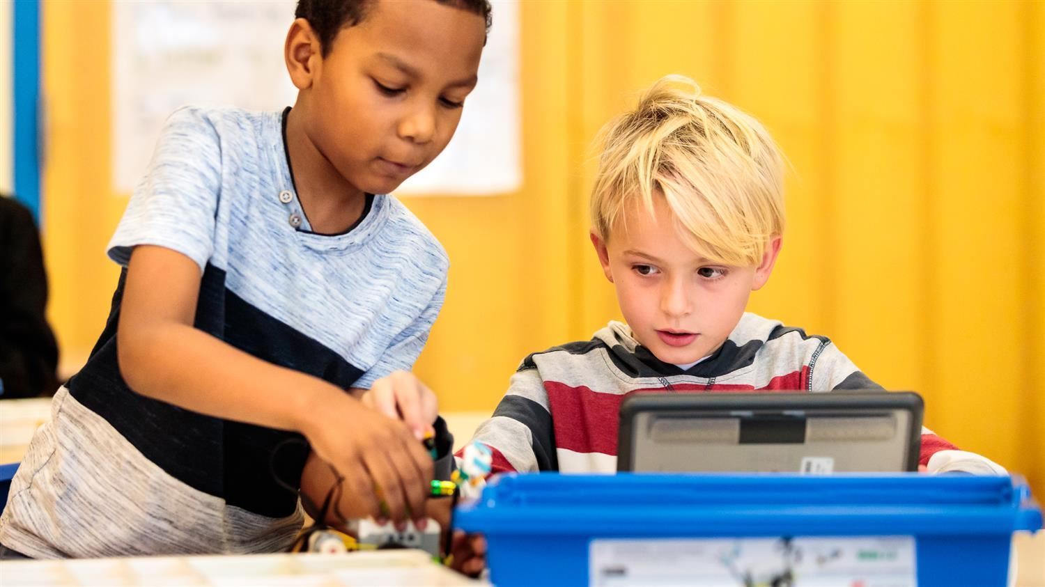 photo of 2 students playing photo of 2 students playing