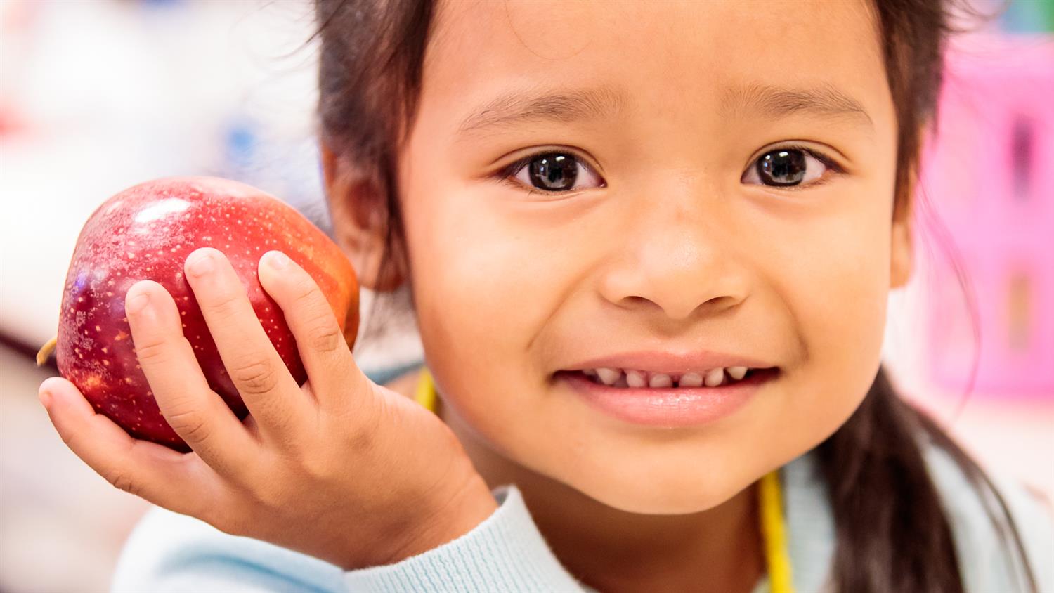 child with an apple child with an apple