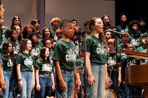 Two students singing a solo piece