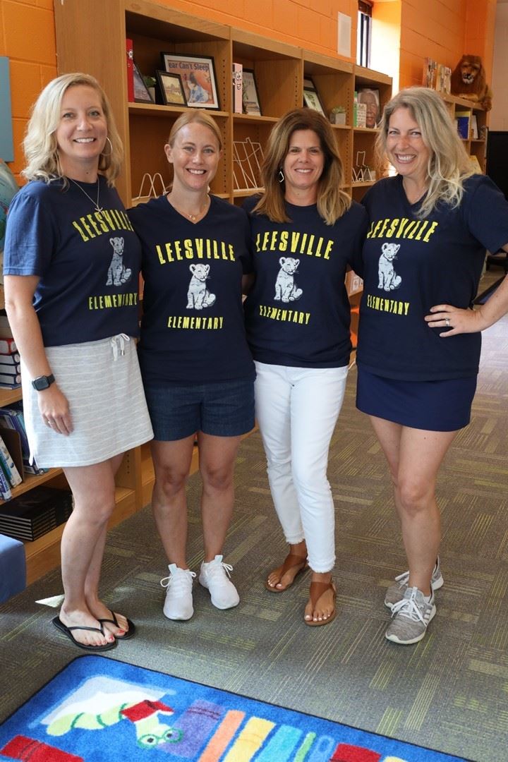 4th Grade teachers in the staff shirts