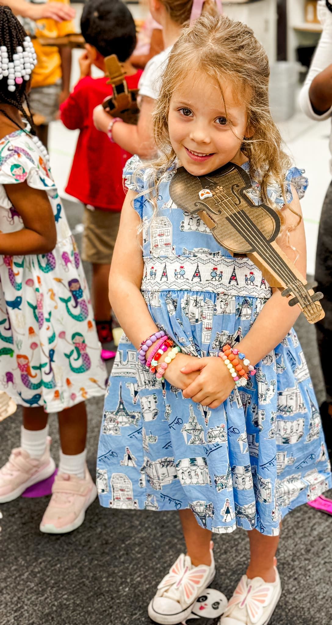 Girl holding violin 