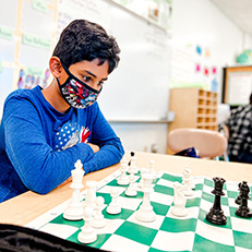  boy playing chess