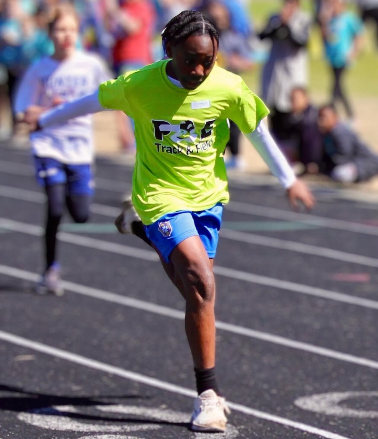  student finishing a track race