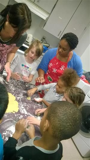 volunteer baking with children