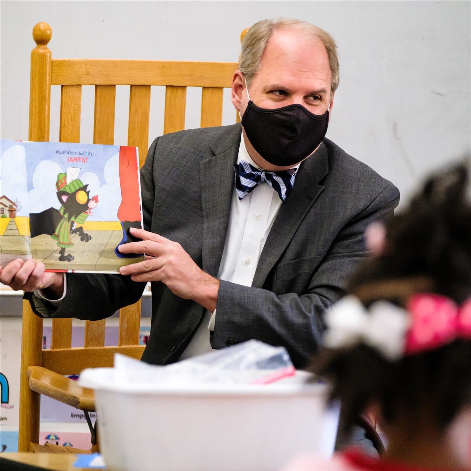 volunteer reading to students