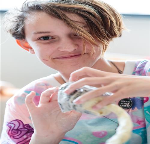 Girl making sculpture