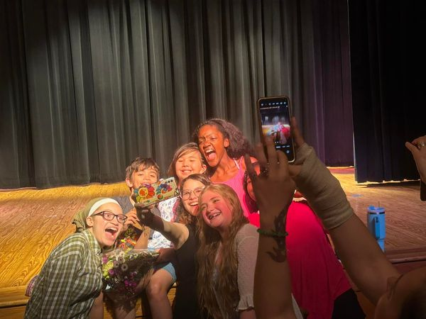 Kids in a group smiling