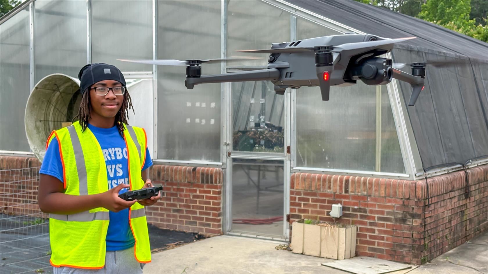 A student at East Wake Magnet High pilots a drone