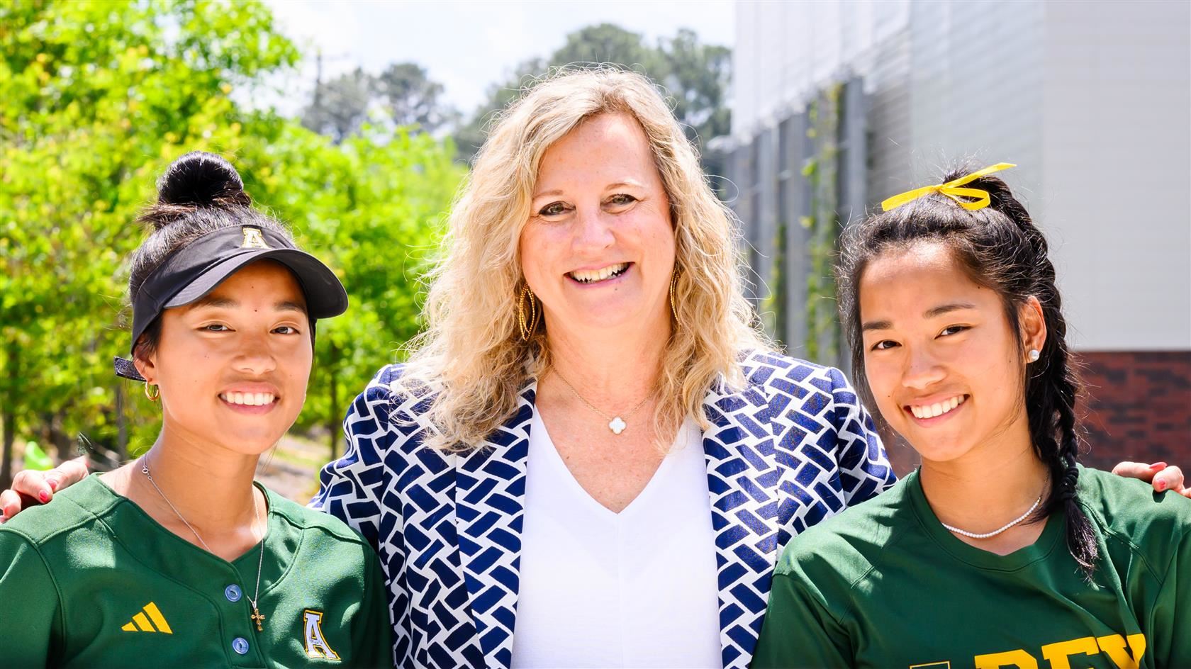 Whittlesey twins with Principal Hofmann