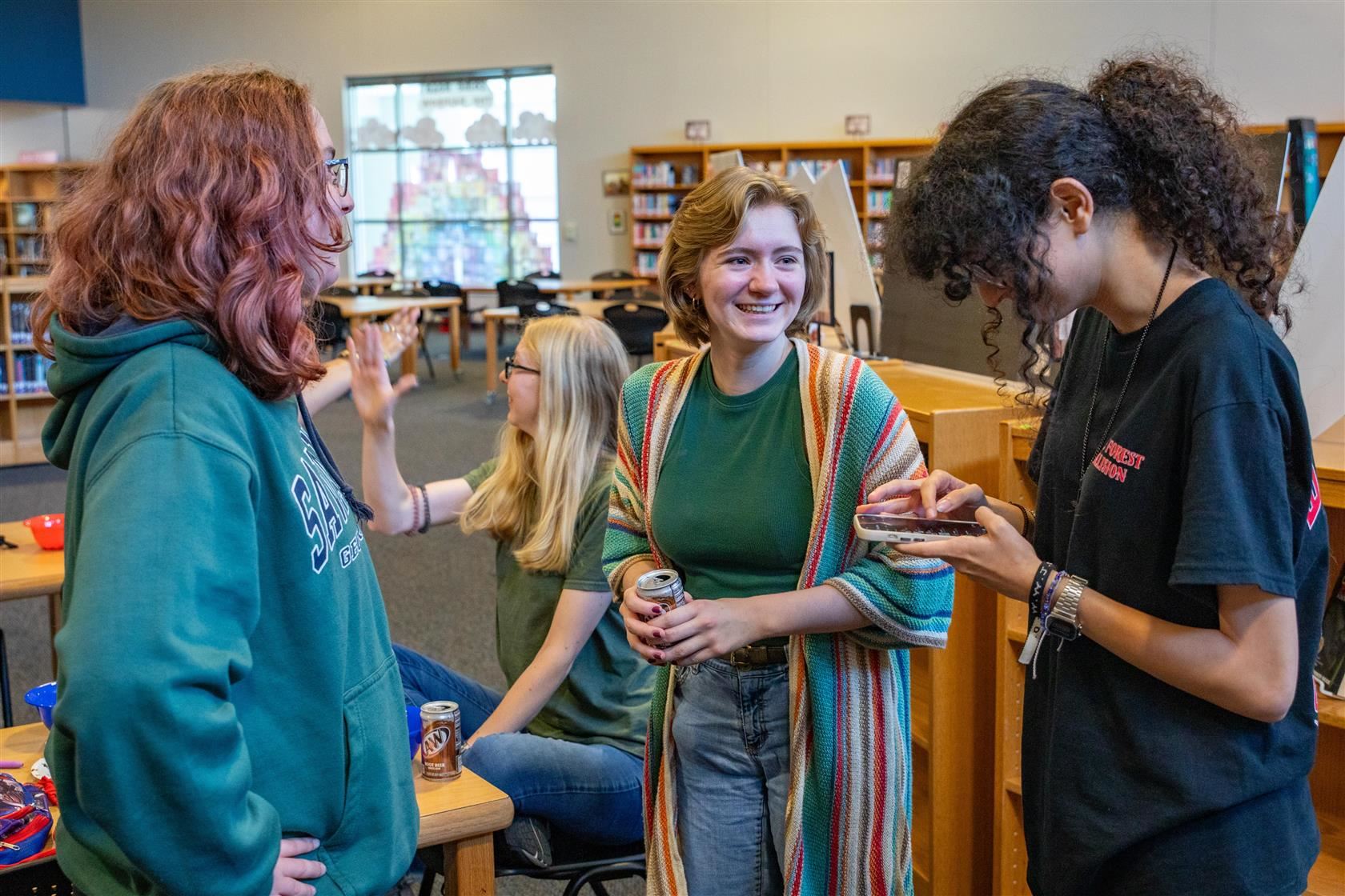 Jillian laughs with friends at a Yearbook Club celebration