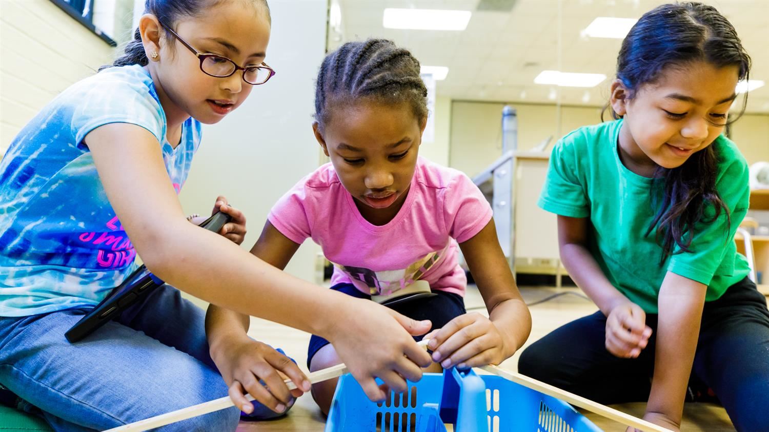 Bugg Magnet Elementary students work collaboratively on a design project. 