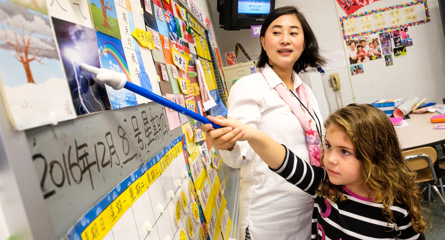 photo of teacher with student photo of teacher with student