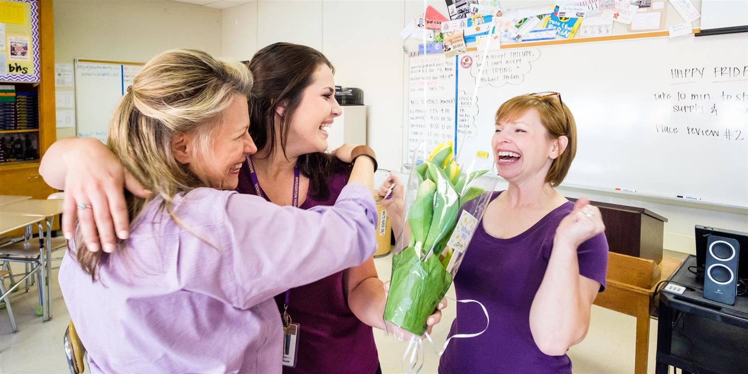 photo of teacher hugging teachers 