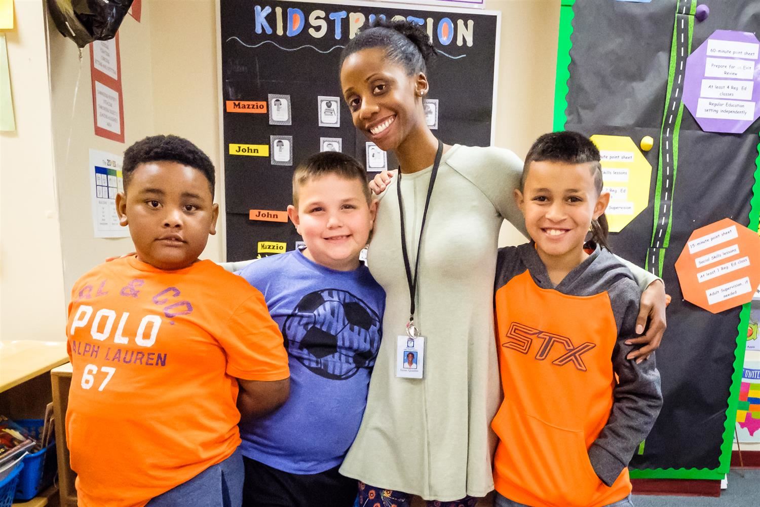 photo of teachers with students 