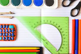  School supplies on open notebook
