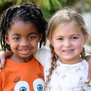  two smiling students